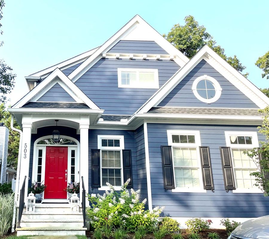 Blue house with a red door