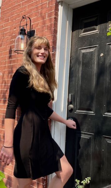 A Homebuyer Brokerage client at the door of her new rowhouse